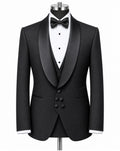 A black tuxedo jacket with satin peak lapels, displayed on a mannequin torso with a white pinstripe shirt, black bow tie, and matching black vest against a plain white background.