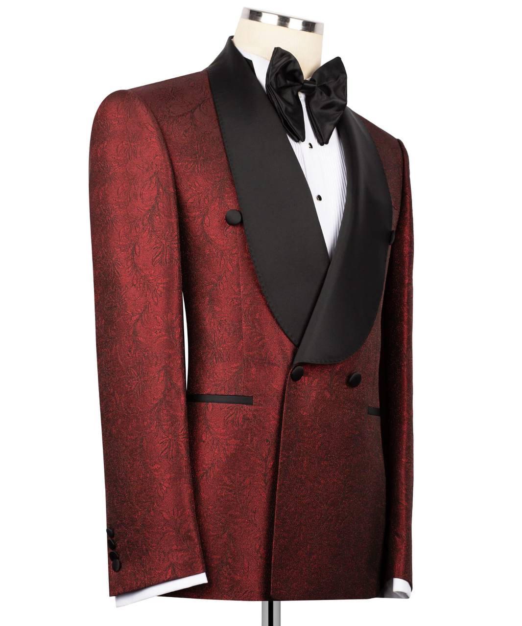 Red tuxedo with black lapels on a mannequin against a white background