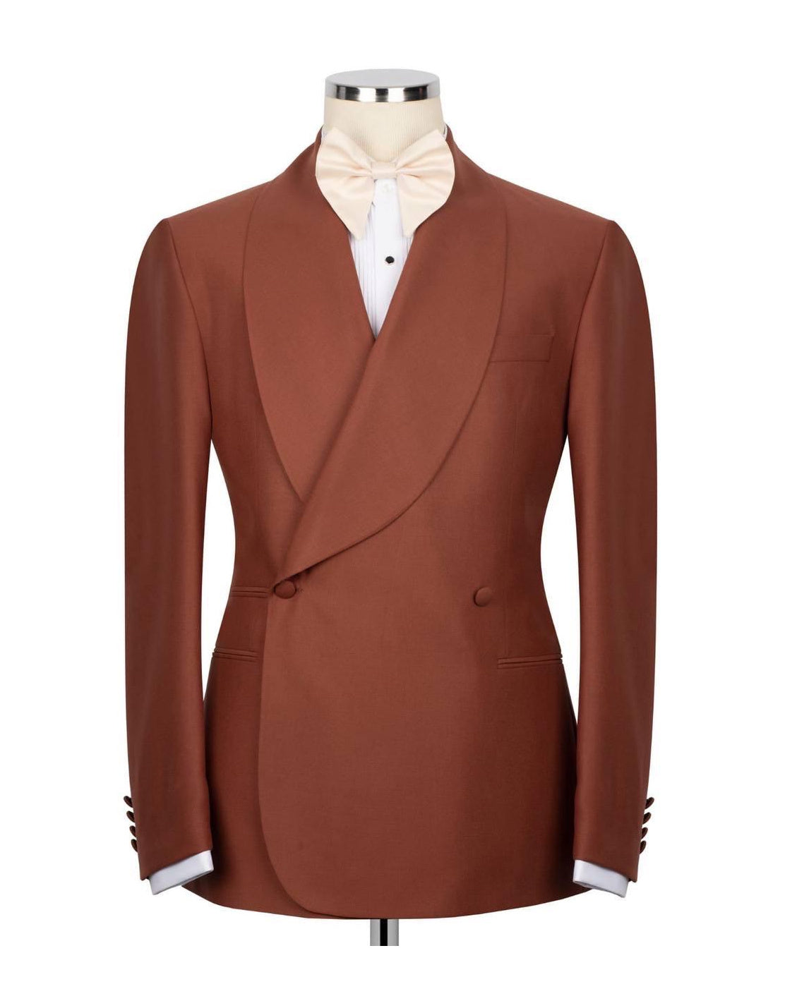 A men's brown double-breasted tuxedo jacket with shawl lapels, displayed on a mannequin torso with a white dress shirt and light beige bow tie against a plain white background.