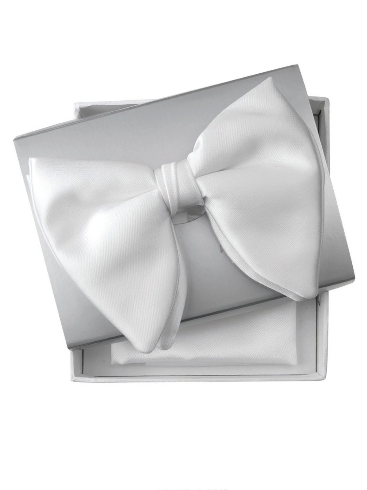 A white pre-tied bow tie displayed on top of an open white gift box, with a matching white pocket square folded underneath. The text 'BTPB-28 White' appears below the box on a plain white background.