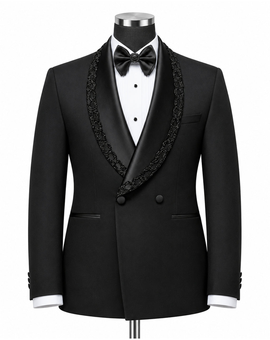 A black double-breasted tuxedo jacket with ornate black lace trim along the shawl collar, displayed on a mannequin torso with a white dress shirt, black bow tie, and white cufflinks against a plain white background.