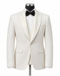 An ivory white tuxedo jacket displayed on a mannequin torso, styled with a white dress shirt, black bow tie, and black neck collar against a plain white background.