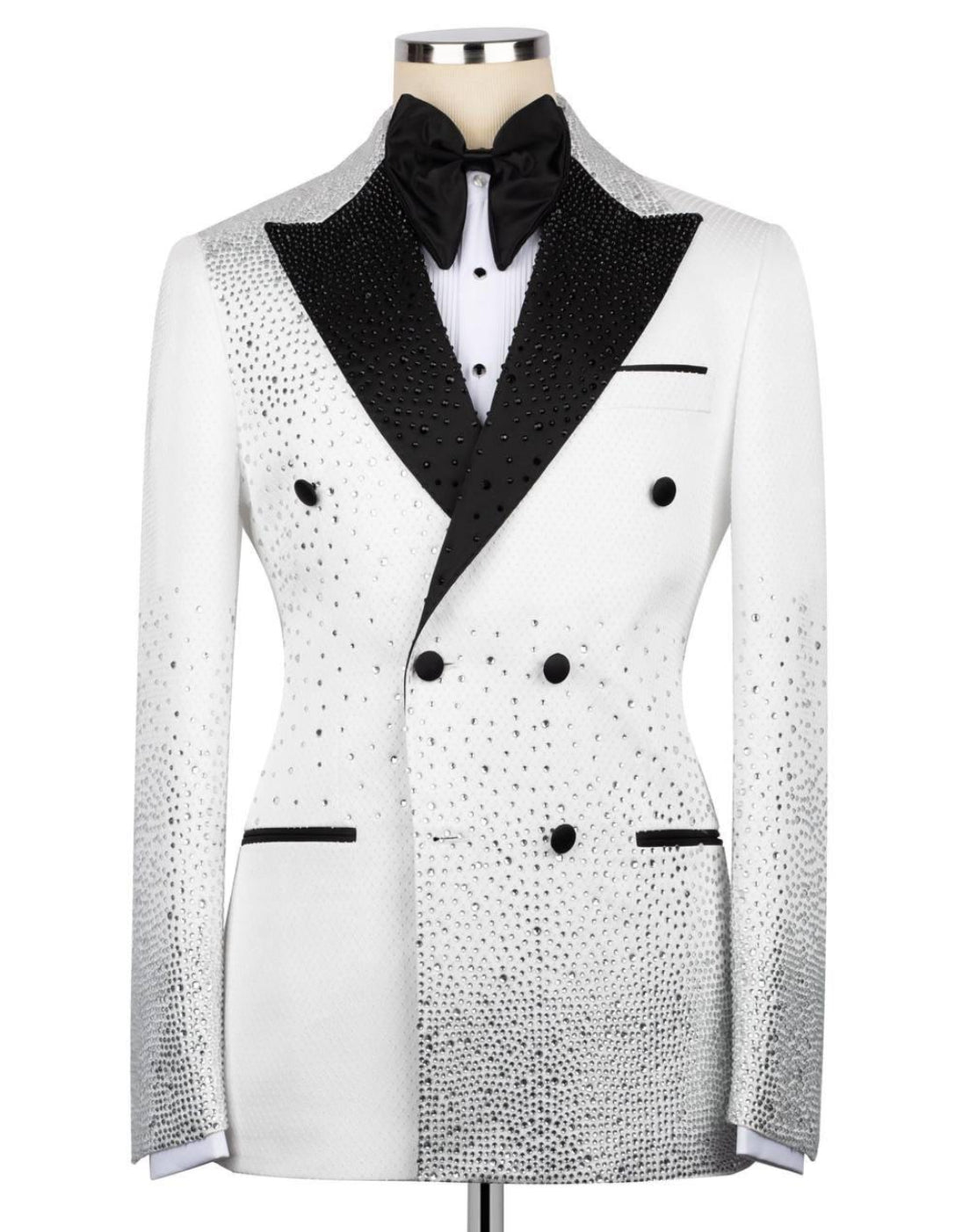 White tuxedo with black lapels on a mannequin against a white background
