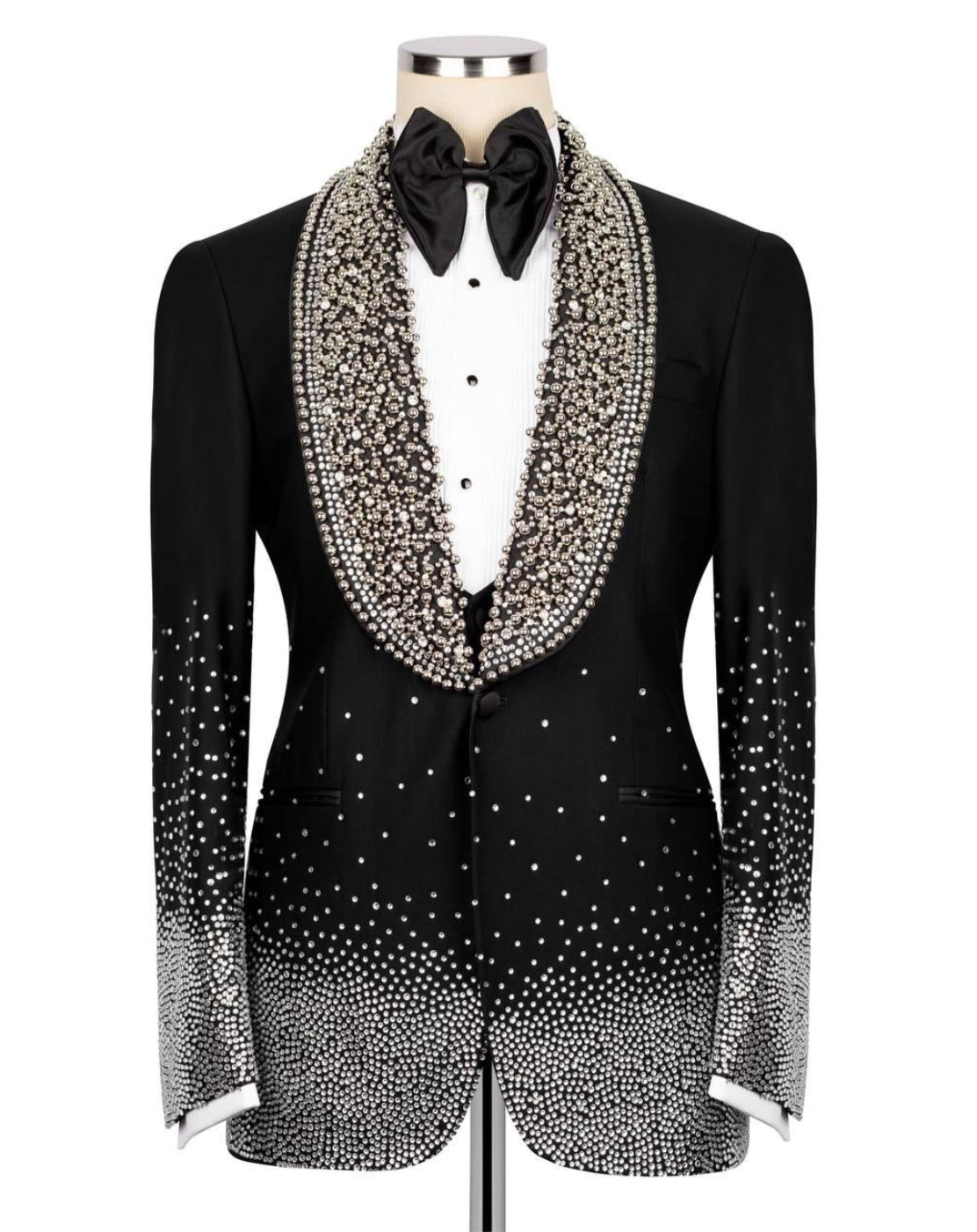 Black tuxedo with crystal embellishments on a white background