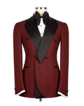 A men's double-breasted tuxedo jacket in a textured burgundy fabric with black satin peak lapels, displayed on a mannequin torso with a black bow tie, white dress shirt, and white cufflinks against a plain white background.