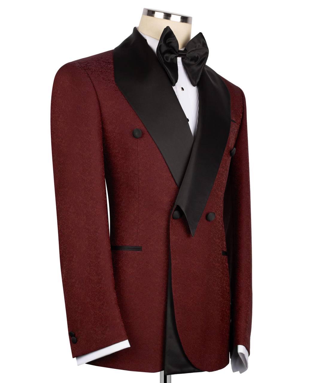 Red tuxedo jacket with black lapels on a mannequin against a white background