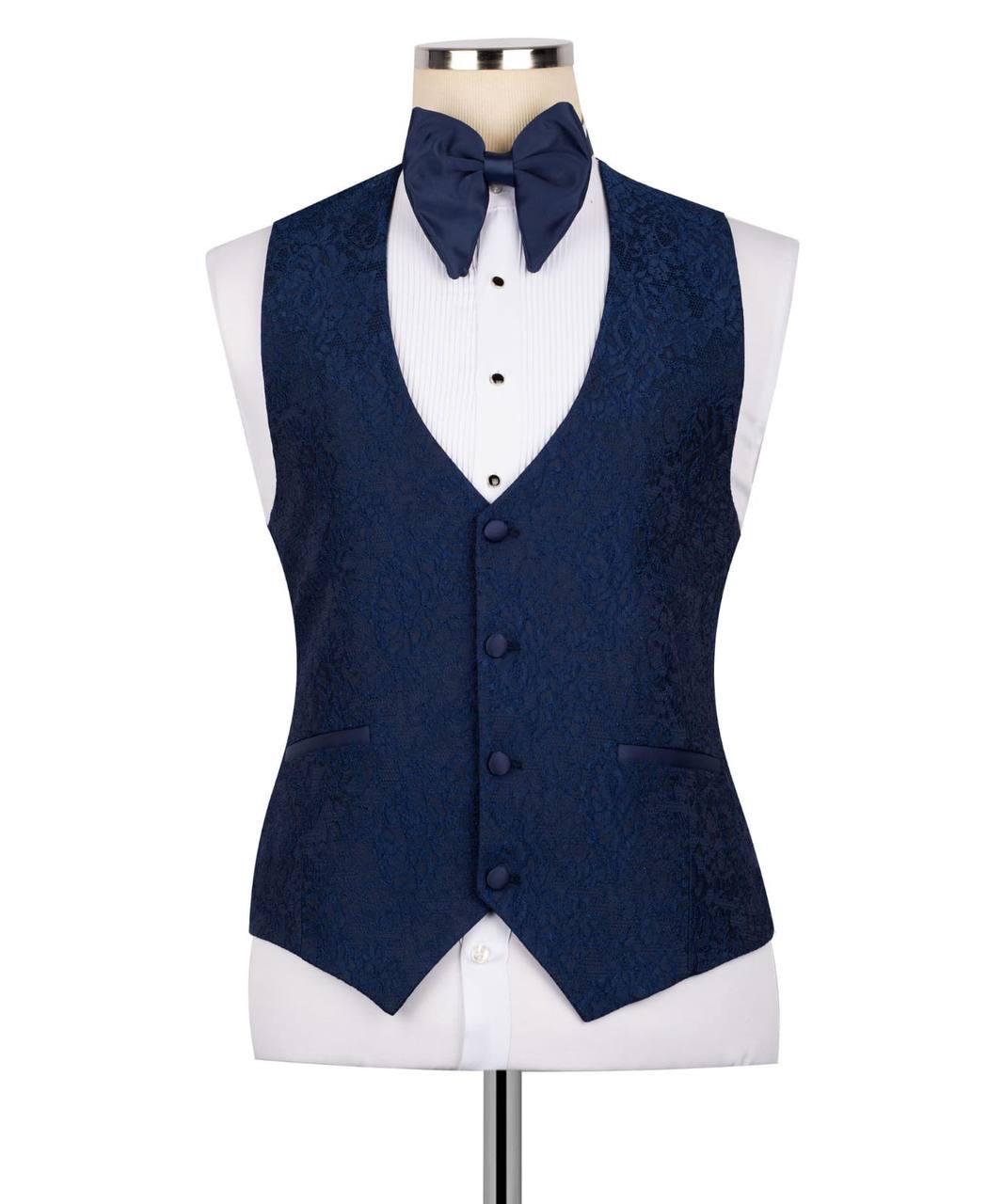 Navy blue vest with matching bow tie on a mannequin against a white background