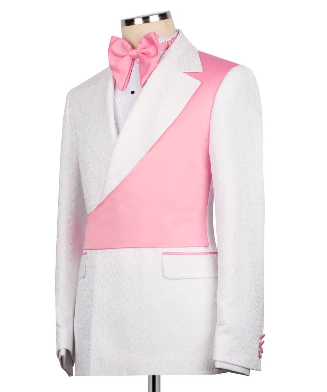 White tuxedo with pink lapels on a mannequin against a white background