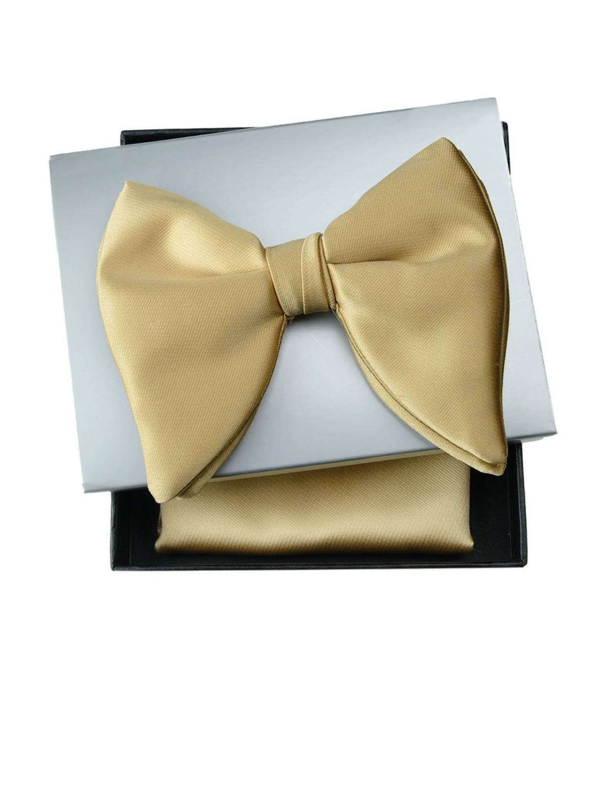 A gold satin bow tie displayed on top of a matching gold pocket square inside an open black gift box with a white insert, photographed on a plain white background.