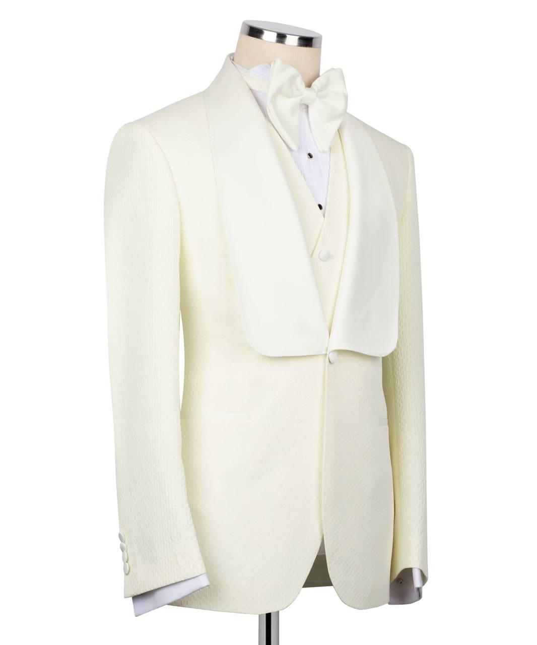 White tuxedo jacket on a mannequin against a white background