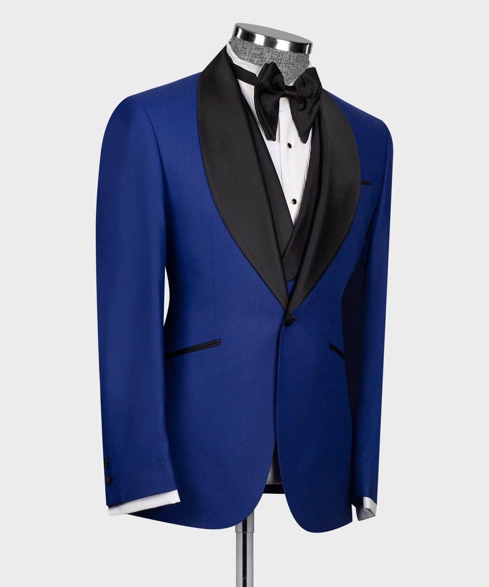 Blue tuxedo with black lapels on a mannequin against a white background