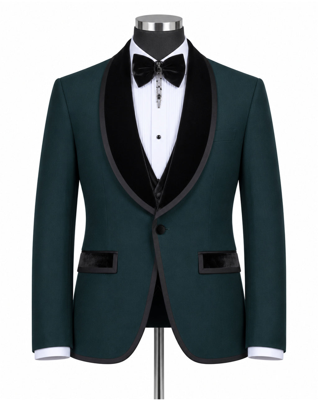 A men's formal tuxedo jacket in dark green with black velvet shawl lapels, displayed on a mannequin with a white dress shirt, black bow tie, and black vest.