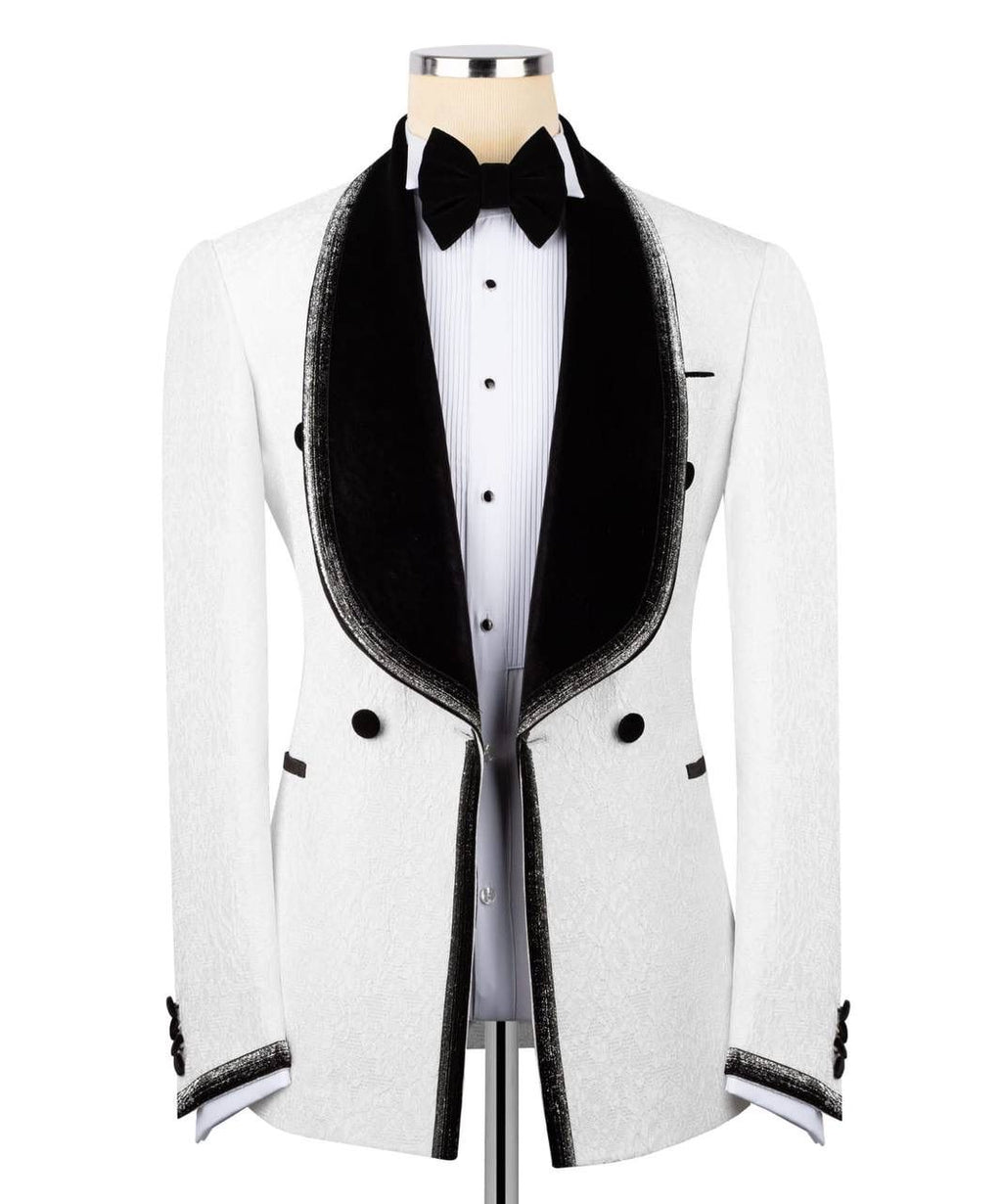 A white tuxedo jacket with black velvet shawl lapels, black trim, and a black bow tie, displayed on a mannequin torso over a white pinstripe shirt.