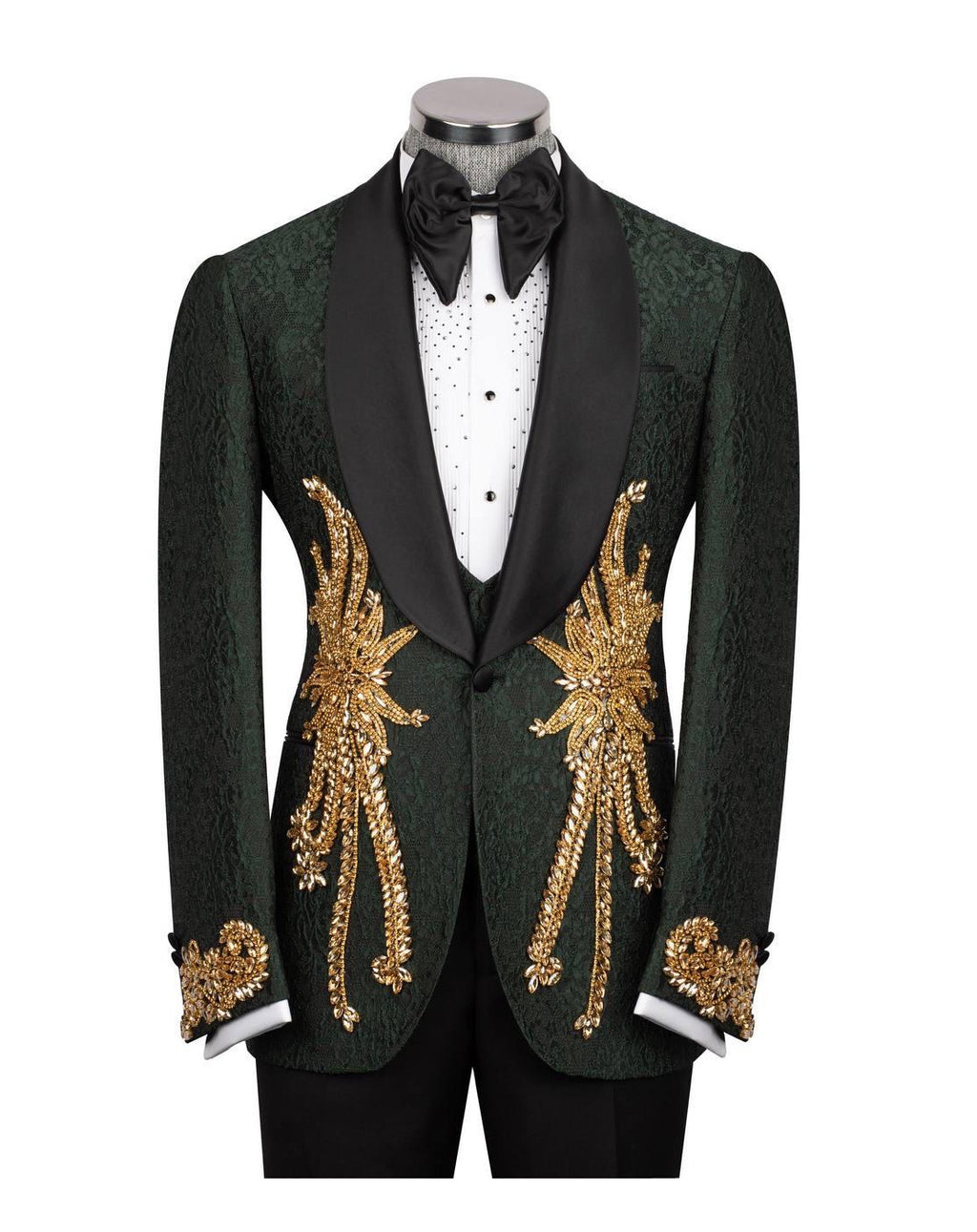 A dark green tuxedo jacket with black satin lapels and elaborate gold sequin and bead embroidery on the front and cuffs, displayed on a mannequin with a black bow tie and white shirt.