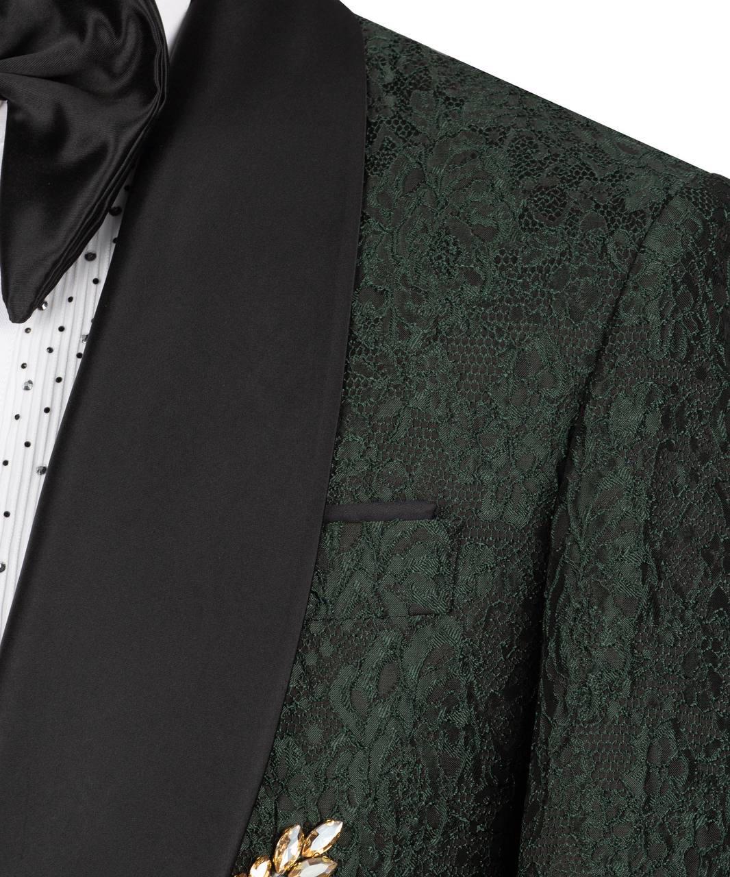 Green lace dinner jacket with a black bow tie and white shirt