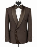 A men's double-breasted tuxedo jacket in dark brown with satin shawl lapels, displayed on a black mannequin torso with a white dress shirt and matching brown bow tie against a plain white background.