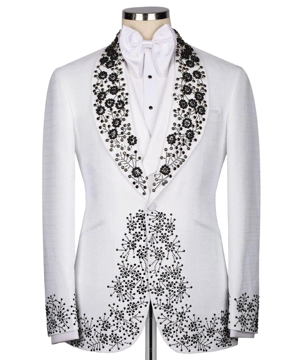 White tuxedo with black floral embroidery on a white background