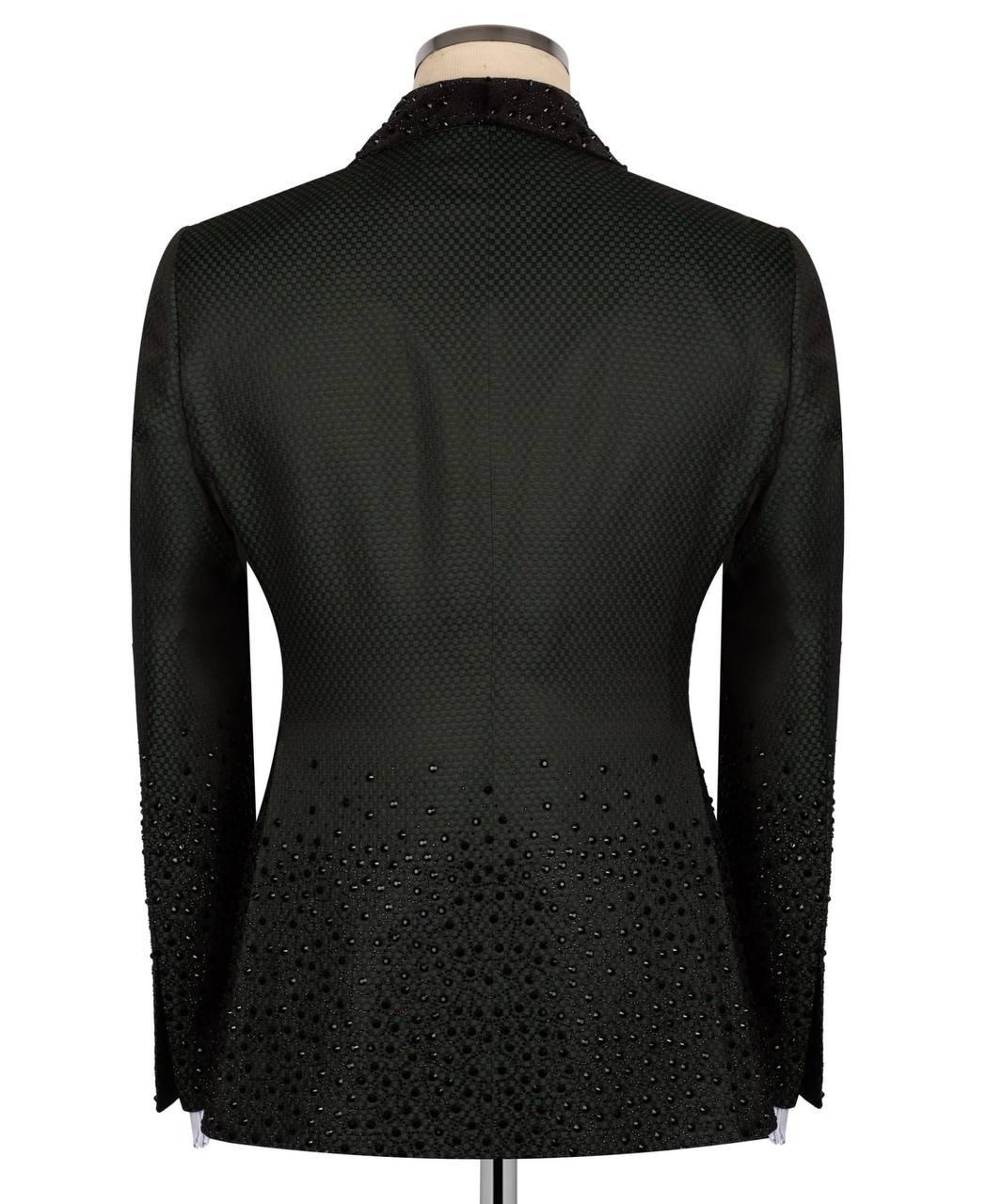 Black textured blazer on a mannequin against a white background