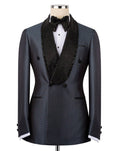Black patterned tuxedo jacket with a bow tie on a mannequin against a white background