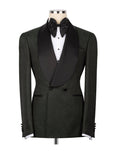 A dark green textured tuxedo jacket with black satin shawl lapels, styled on a mannequin with a black bow tie, white dress shirt, and black cummerbund against a white background.