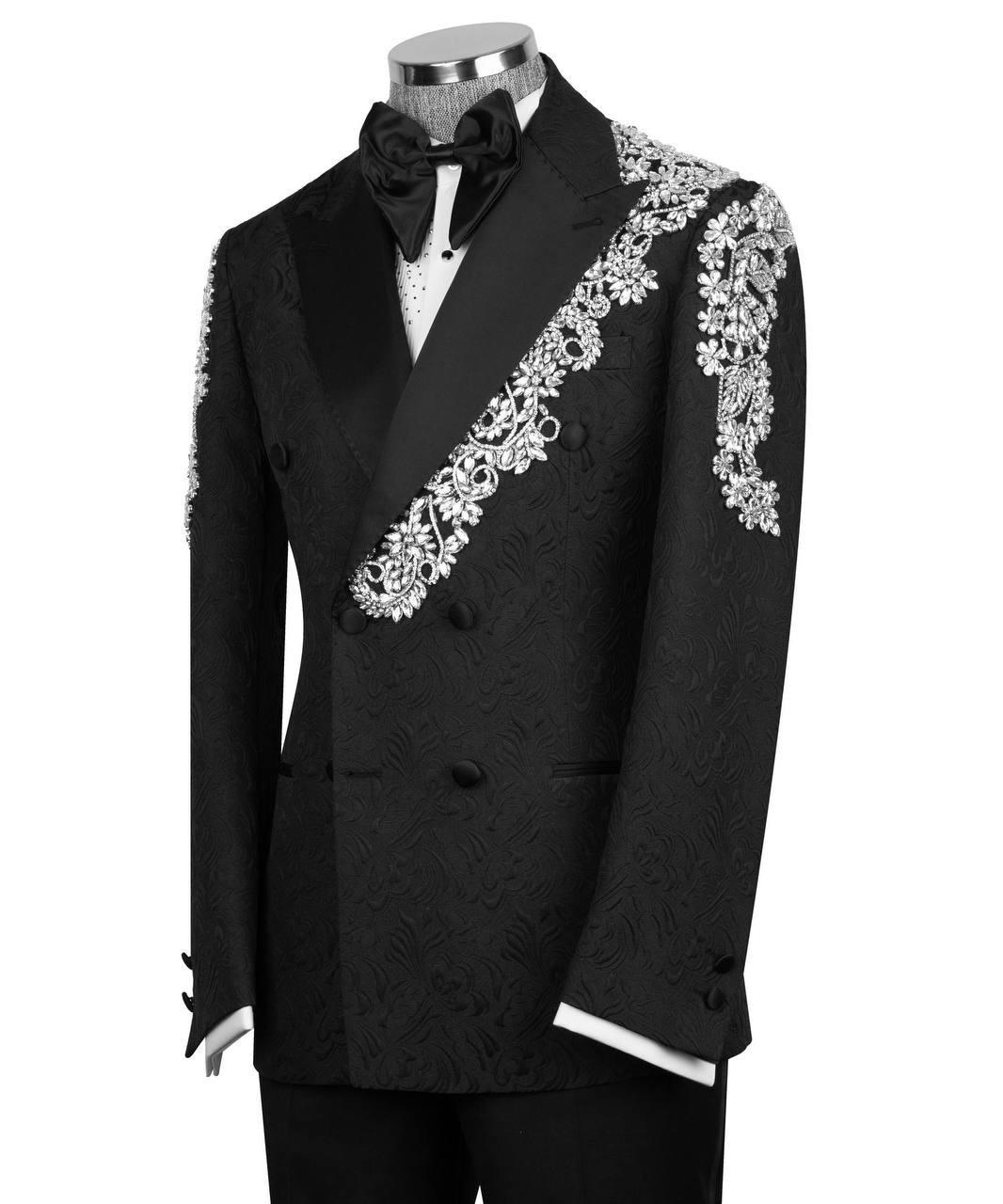 Black tuxedo with white embroidery on a mannequin against a white background