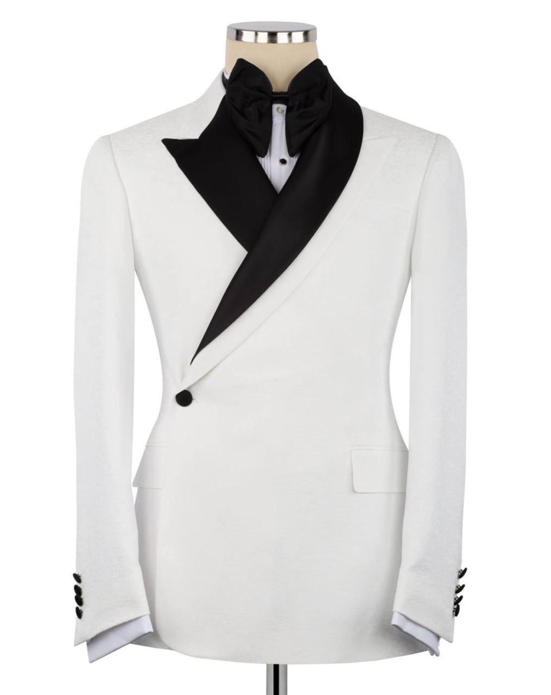 White tuxedo jacket with black lapels on a mannequin against a white background