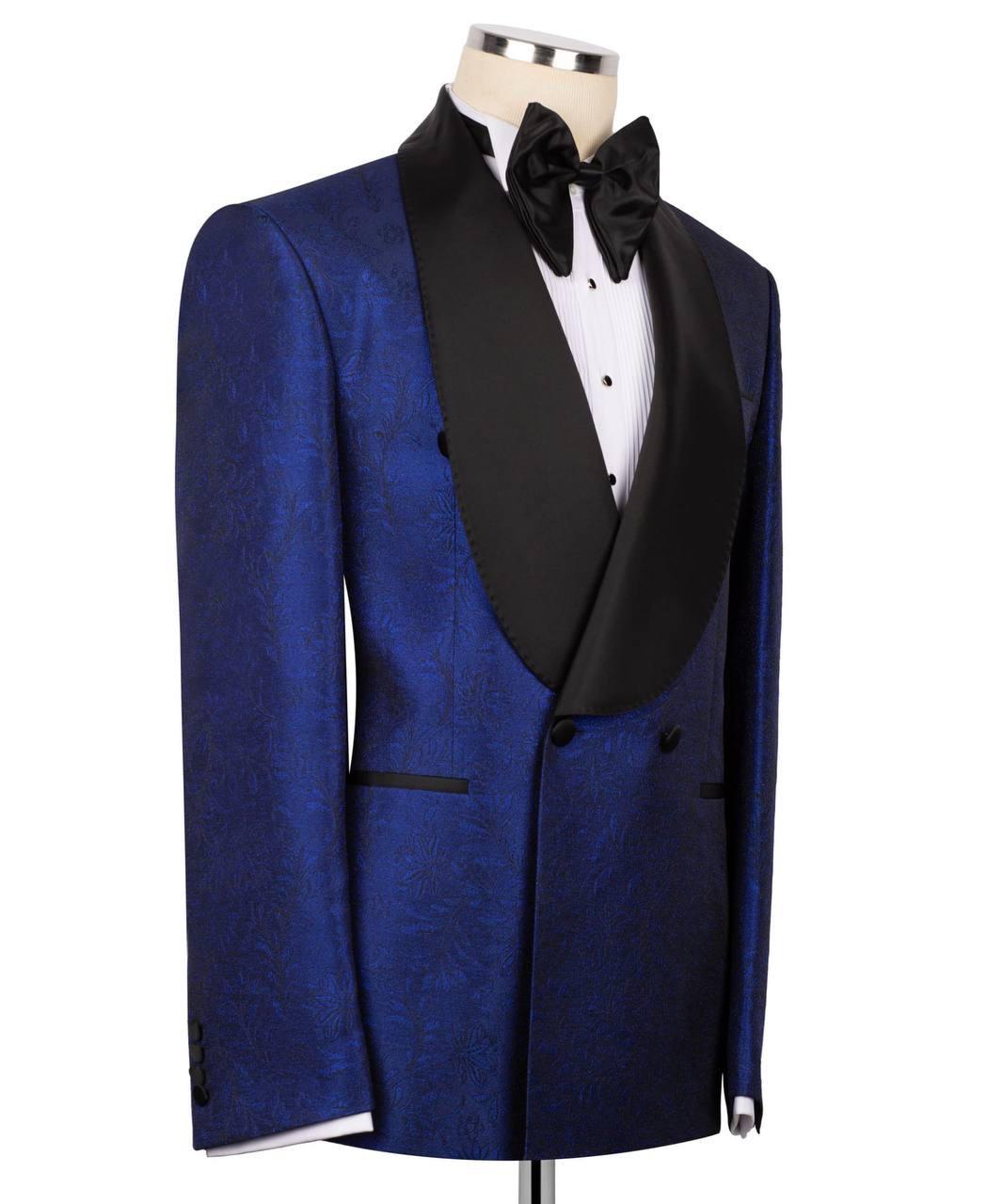 Blue tuxedo with black lapels on a mannequin against a white background