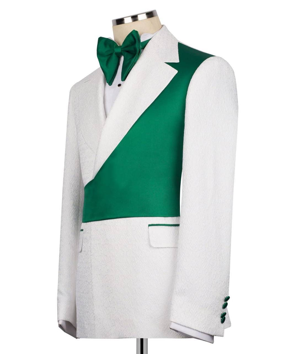 Green and white formal suit on a mannequin with a bow tie against a white background