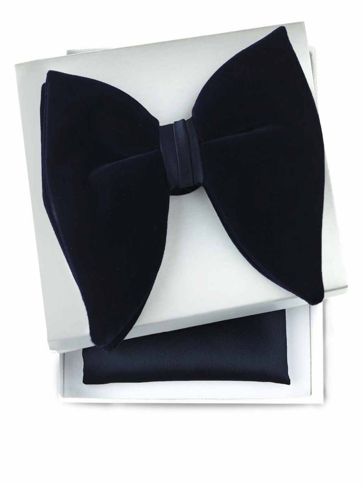 A pre-tied black velvet bow tie displayed on top of its white presentation box, with a matching black pocket square folded underneath.