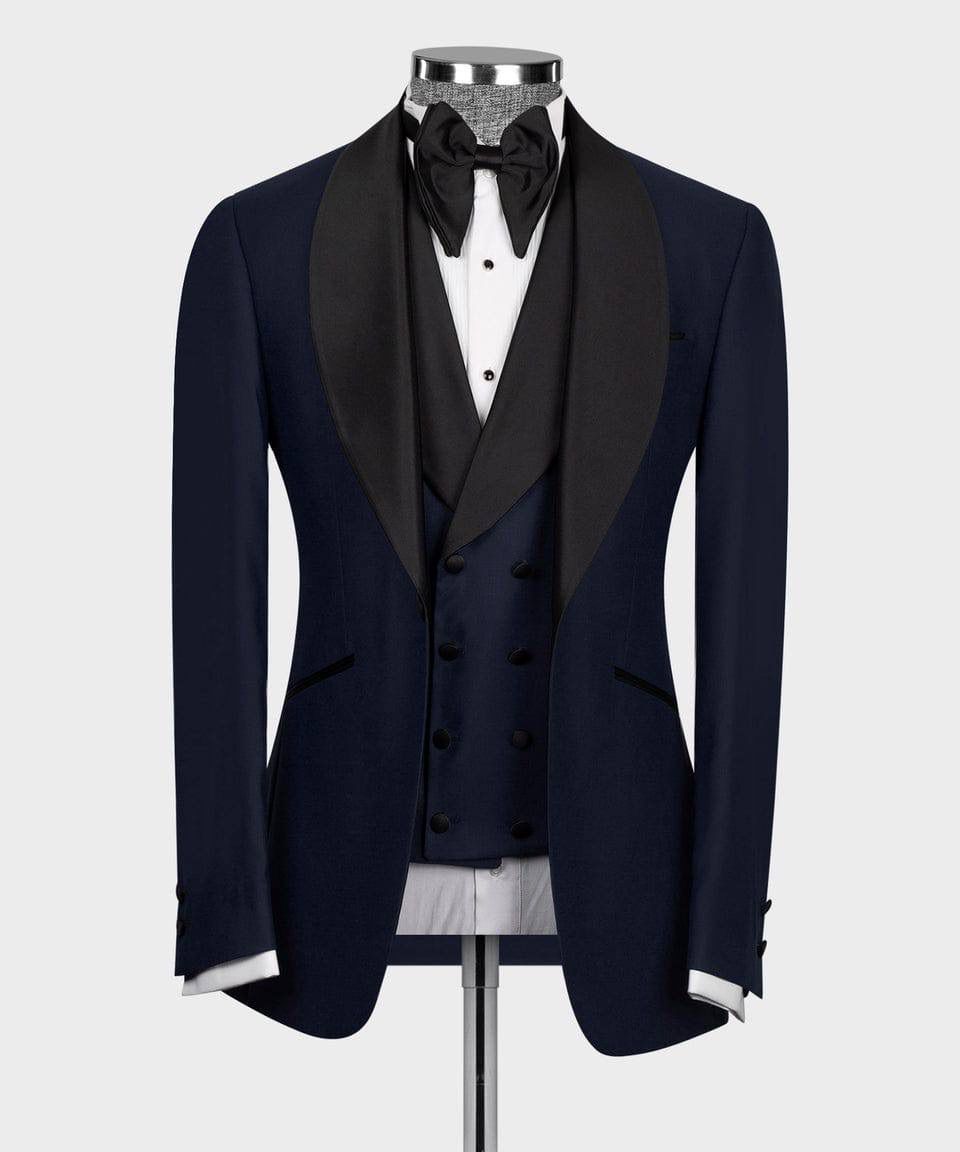 Black tuxedo on a mannequin against a white background