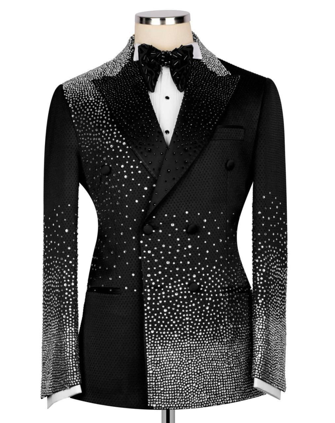 Black tuxedo with silver sequin detailing on a mannequin against a white background