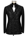 A black tuxedo jacket with intricate silver beaded and sequined floral patterns, styled on a mannequin with a white shirt and black bow tie against a light gray background.