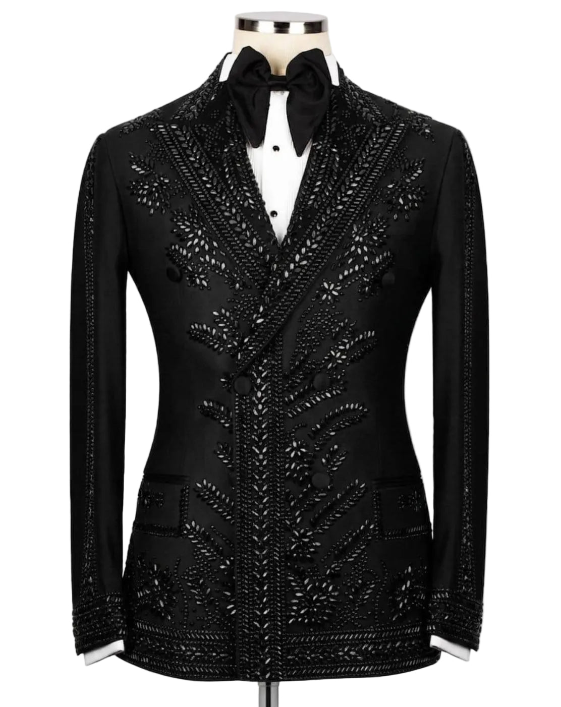 A black tuxedo jacket with intricate silver beaded and sequined floral patterns, styled on a mannequin with a white shirt and black bow tie against a light gray background.