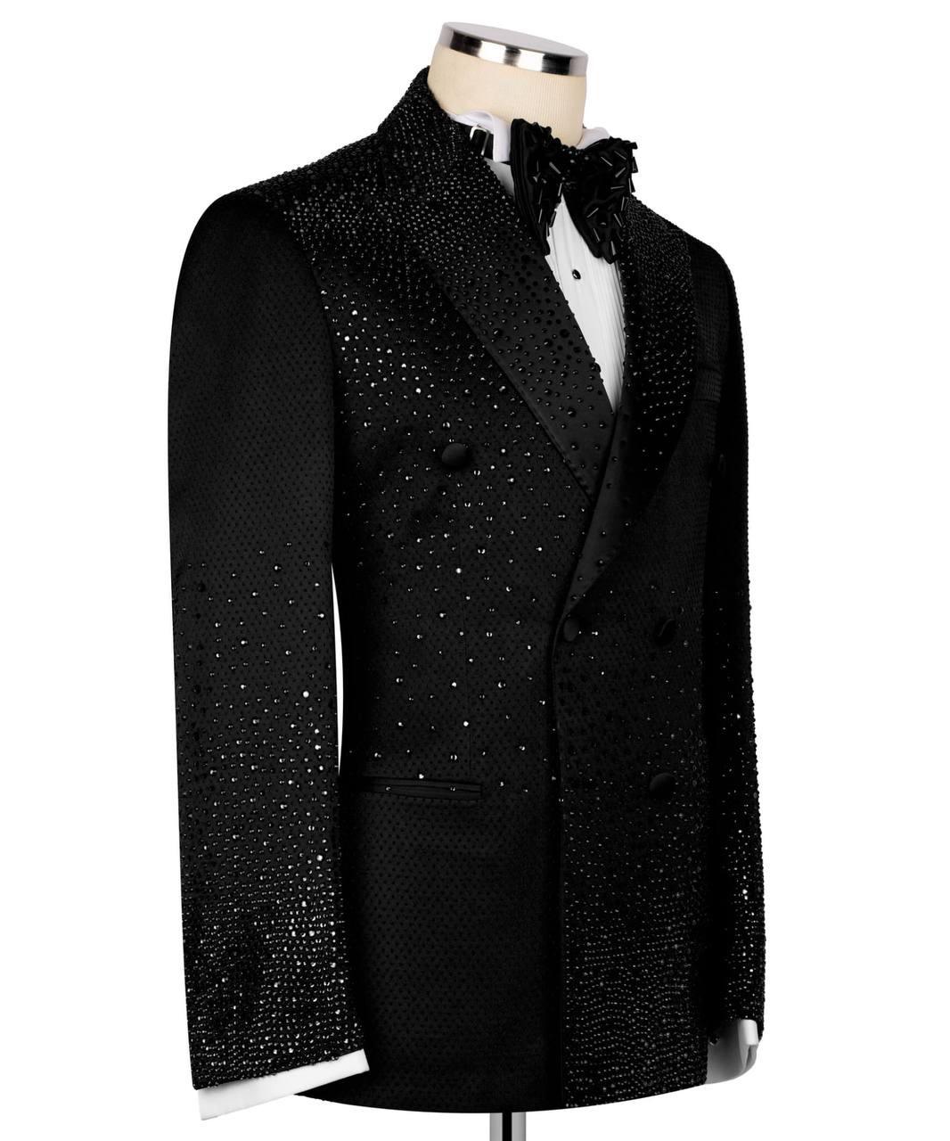 Black tuxedo jacket with sequin details on a mannequin against a white background