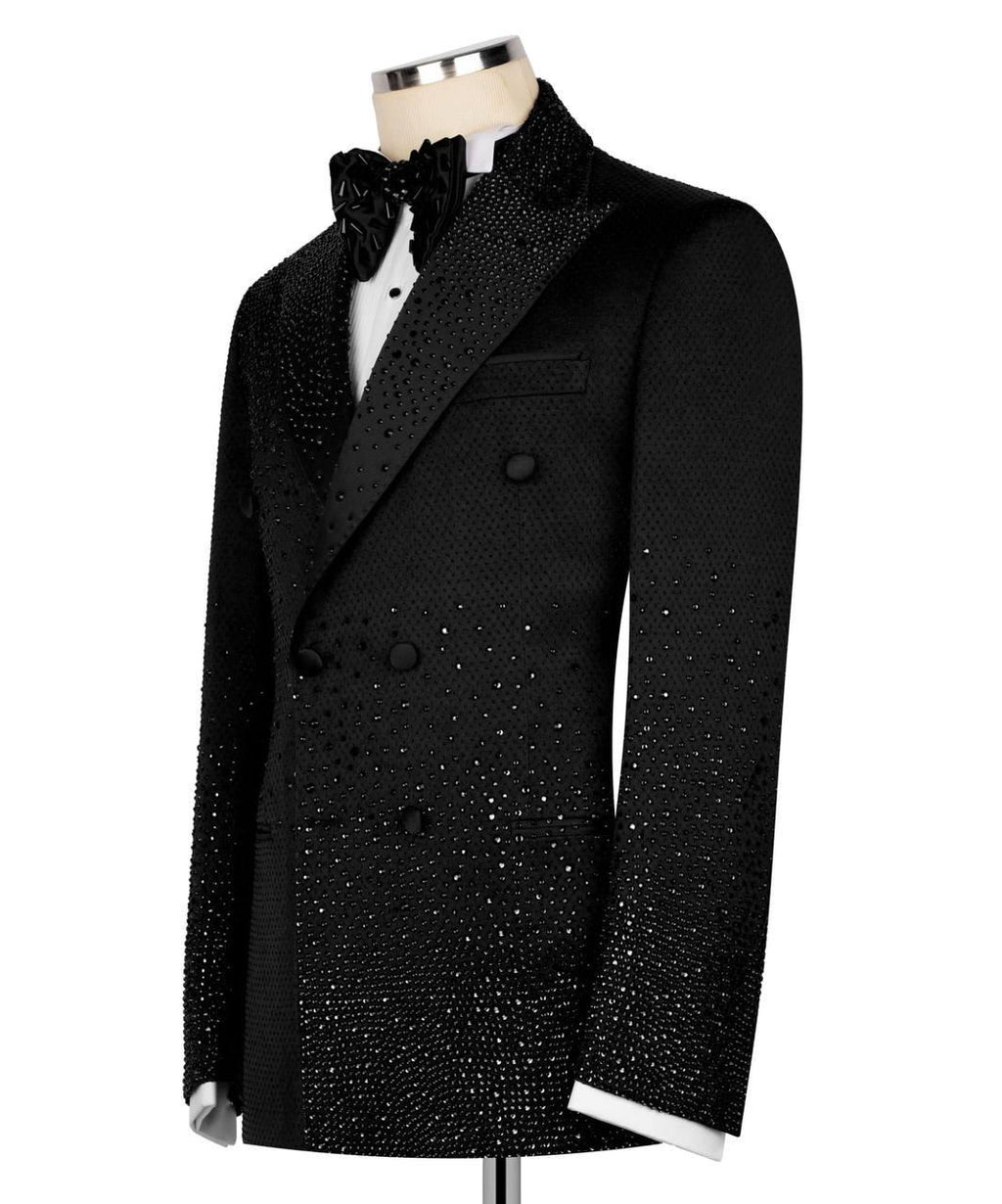 Black tuxedo jacket with white shirt on a mannequin against a white background