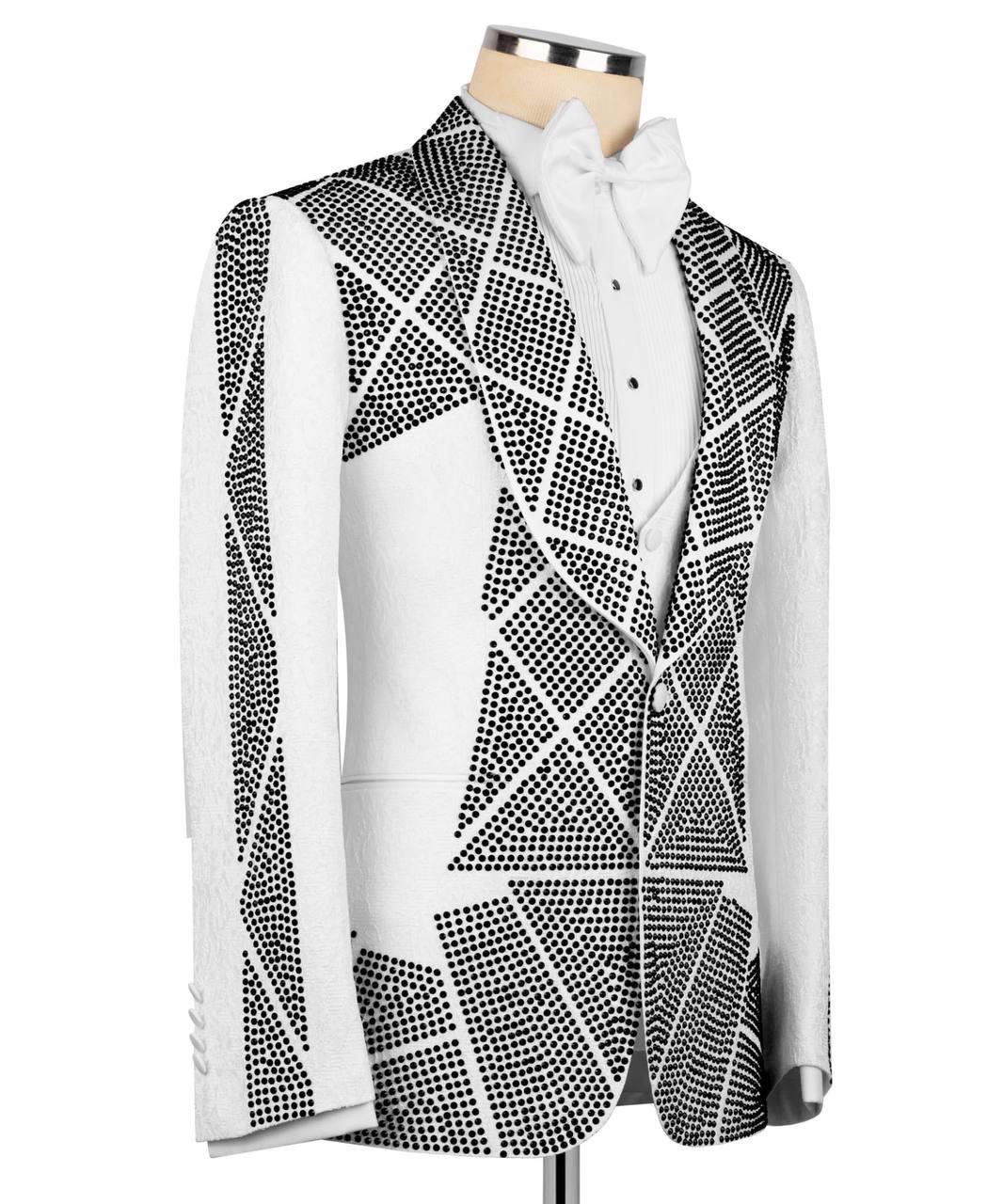 Black and white patterned vest on a mannequin with a white shirt underneath.