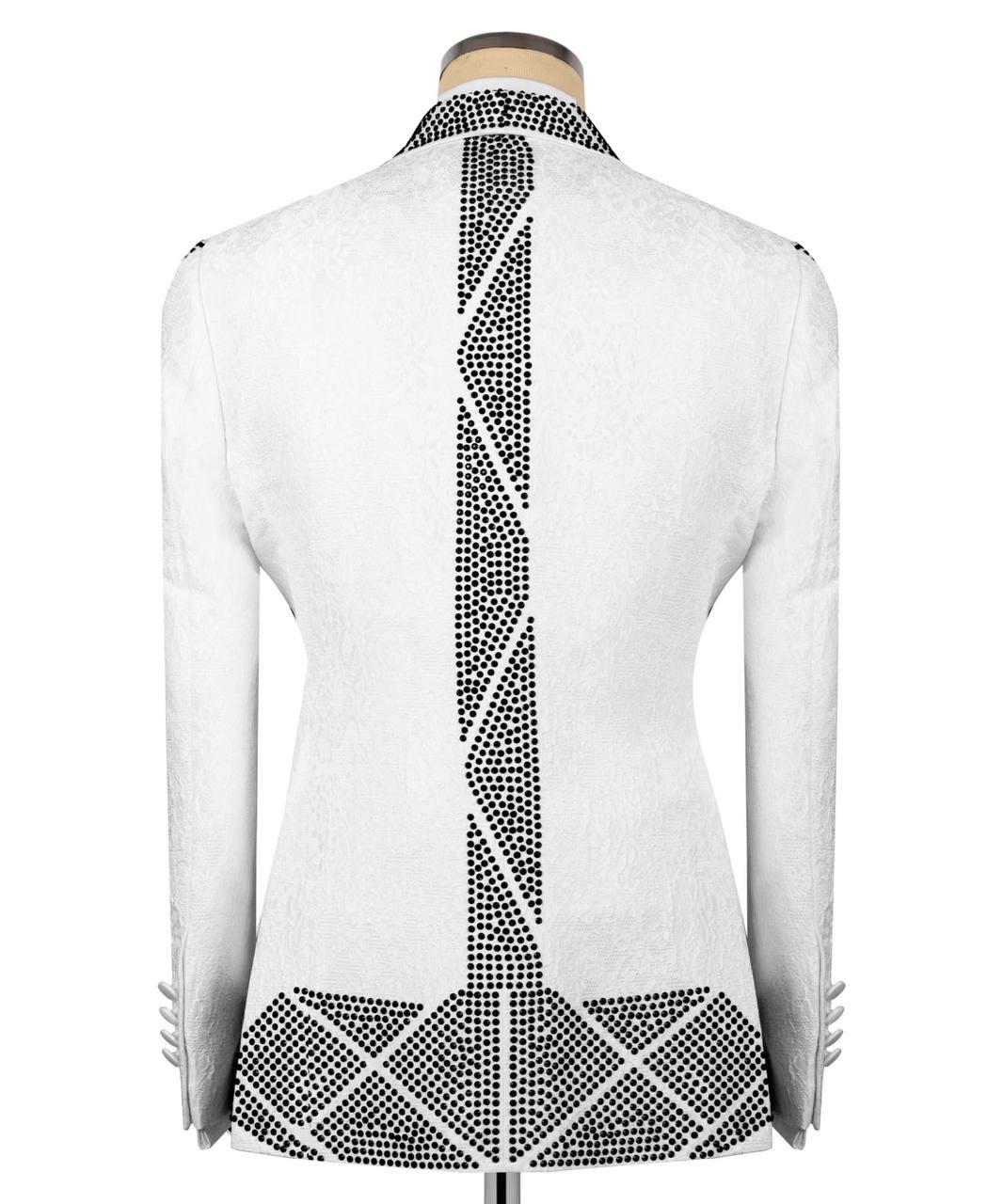 White blazer jacket with a black and white rhinestone geometric pattern on the back, displayed on a mannequin against a white background.