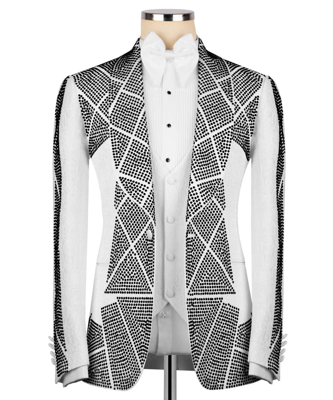 Black and white patterned vest over a white shirt on a mannequin against a white background