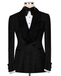 Black tuxedo with decorative lapels on a mannequin against a white background