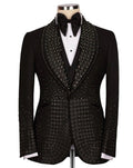Black tuxedo with intricate detailing on a mannequin against a white background