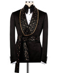 Black tuxedo with gold embellishments on a mannequin against a white background