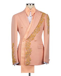 Pink suit with gold embroidery on a mannequin against a white background