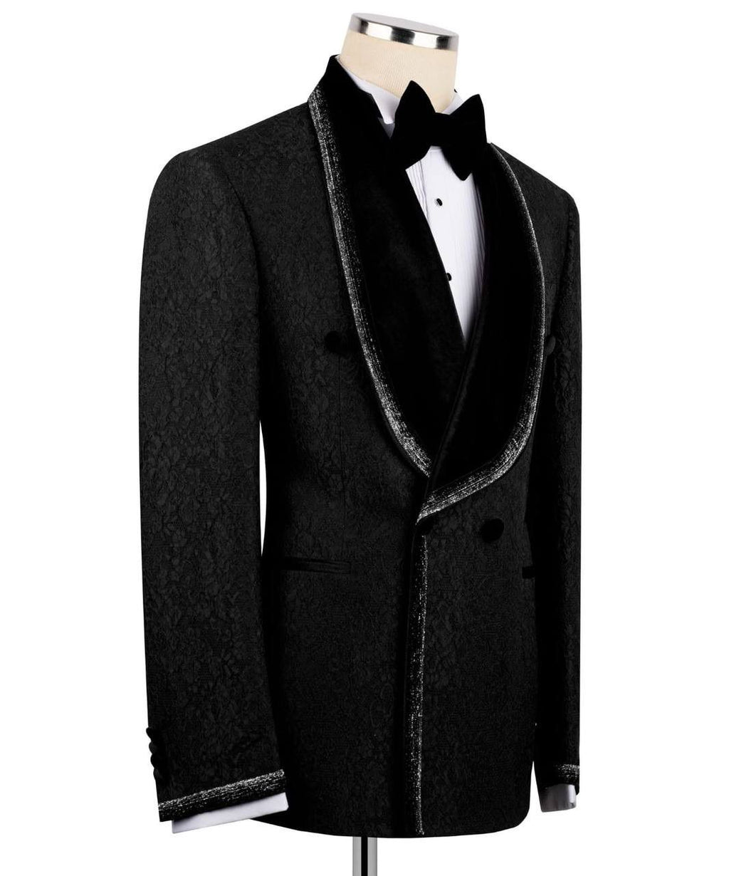 Black tuxedo jacket with velvet lapels on a mannequin against a white background