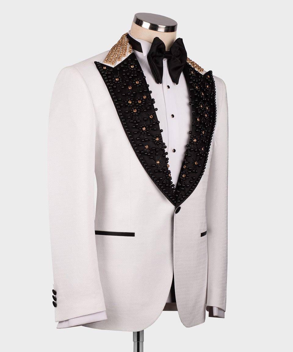White tuxedo with black lapels and gold trim on a mannequin against a white background