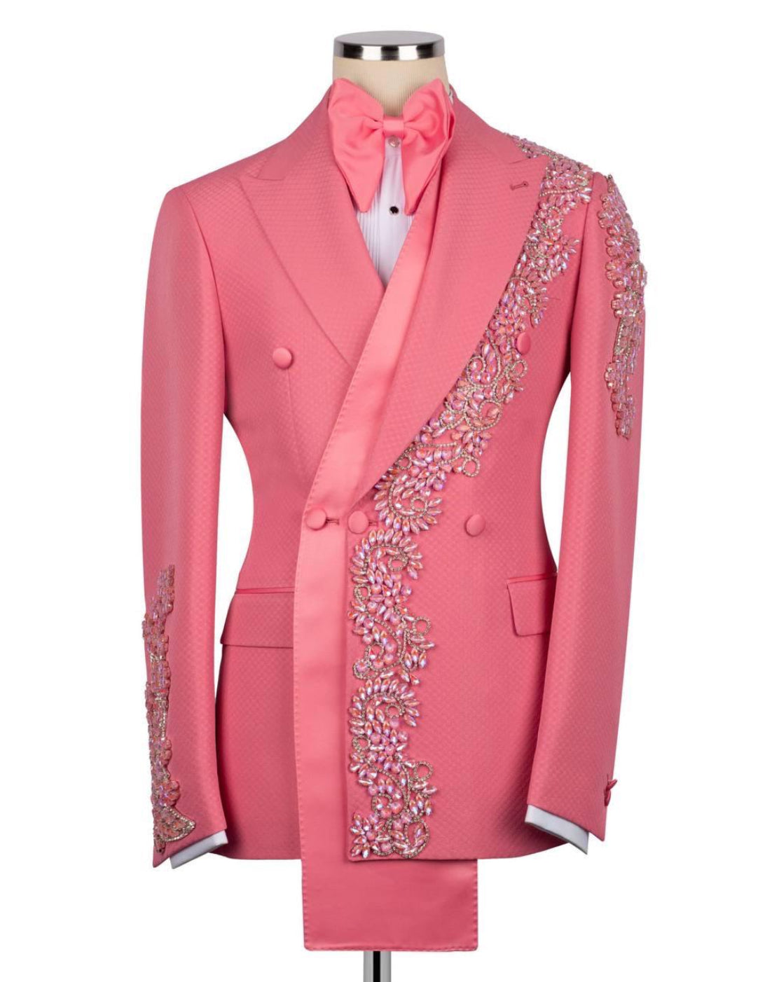 Pink tuxedo with decorative elements on a white background