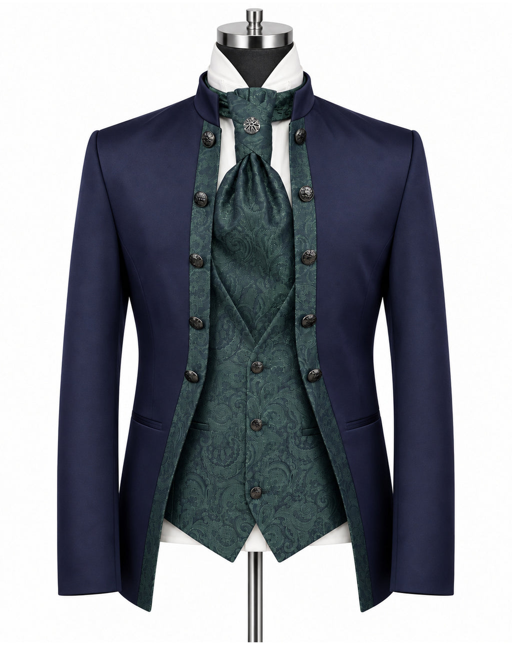 A men's formalwear outfit displayed on a mannequin against a plain white background, featuring a navy blue tailcoat jacket, a dark green patterned waistcoat, matching green patterned cravat, white shirt, and dark buttons.