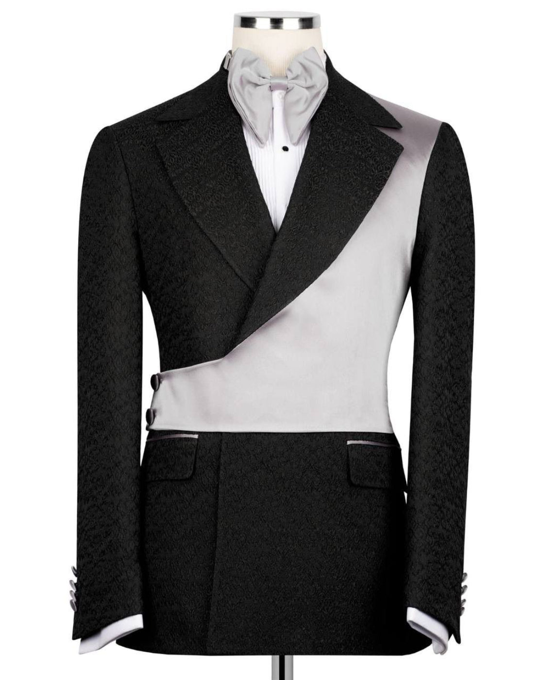Black and white jacket on a mannequin with a white background