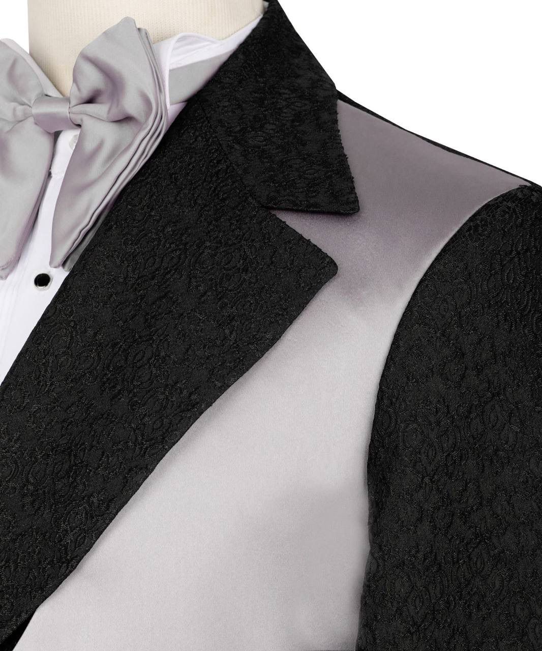 Black lace tuxedo vest with satin lapels, styled on a mannequin with a white dress shirt and a light gray bow tie.