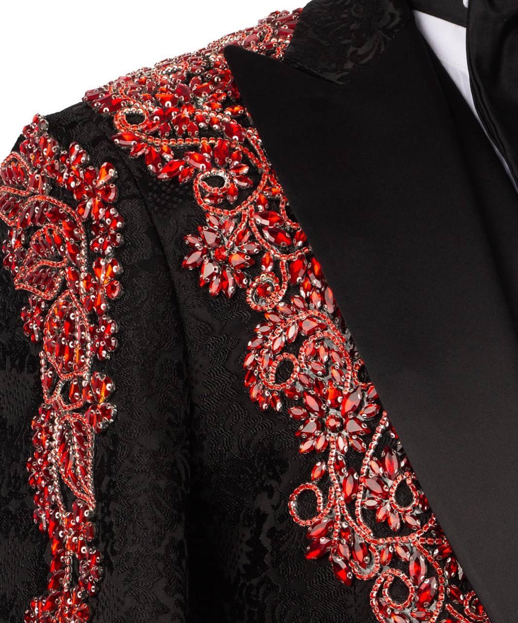 Black garment with red floral embroidery on a white background