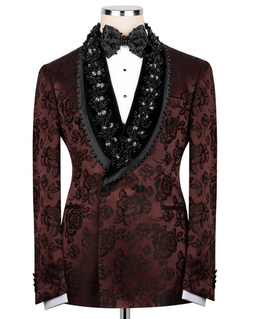 Patterned tuxedo jacket with decorative lapels on a mannequin against a white background